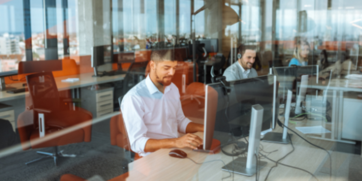 Agents work in an open office-style contact center.